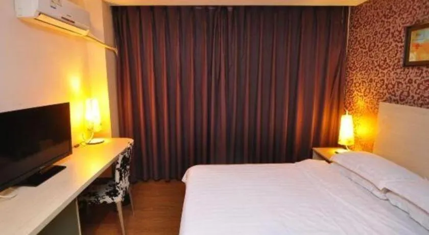 Bed in Pankun Business Hotel