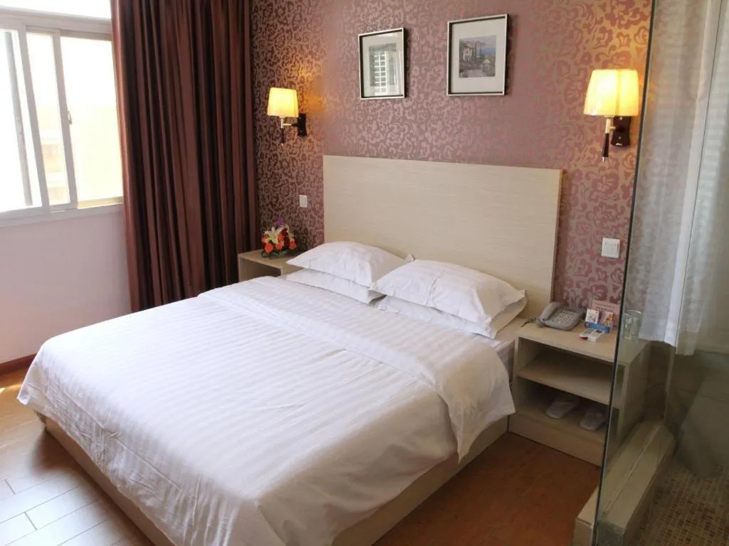 Bed in Pankun Business Hotel