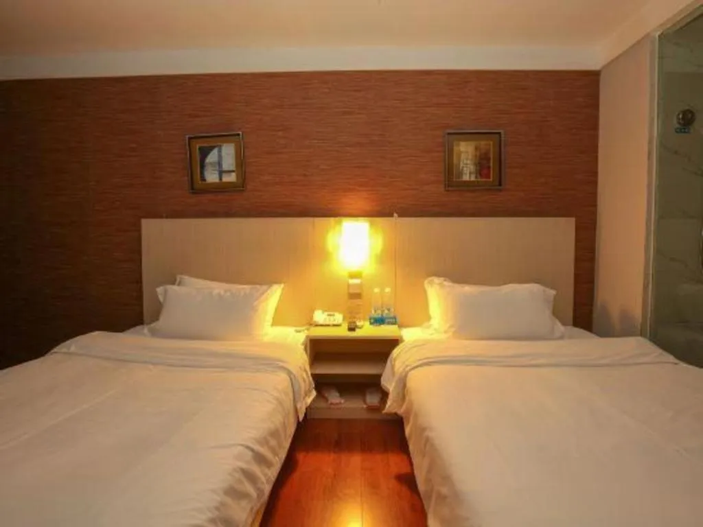 Bed in Pankun Business Hotel