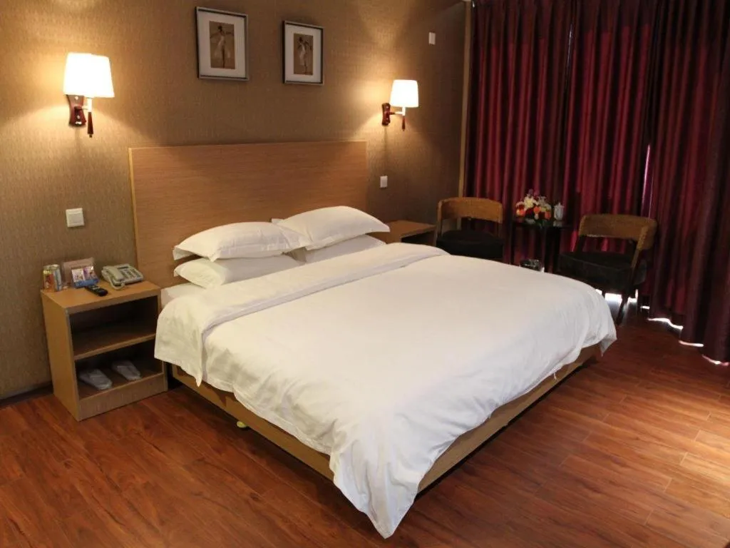 Bed in Pankun Business Hotel