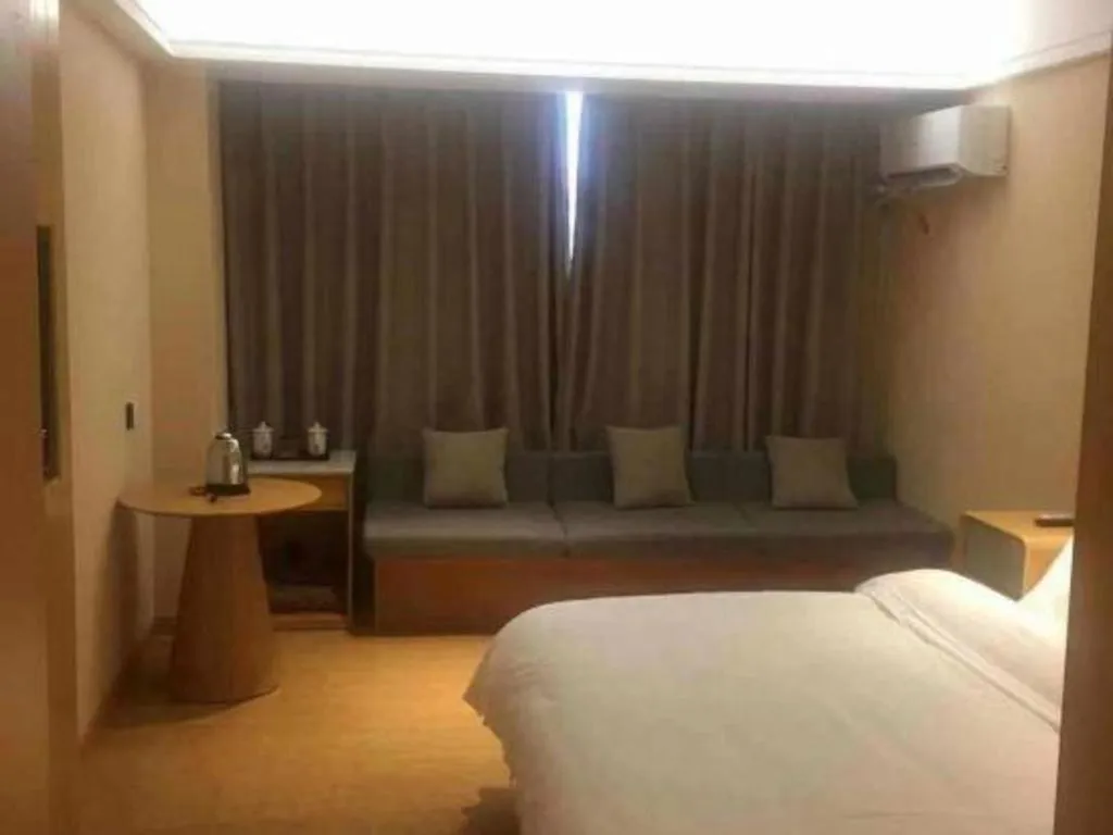 Bed in Pankun Business Hotel