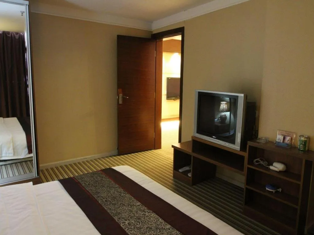 Bed in Pankun Business Hotel