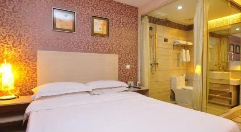 Bed in Pankun Business Hotel