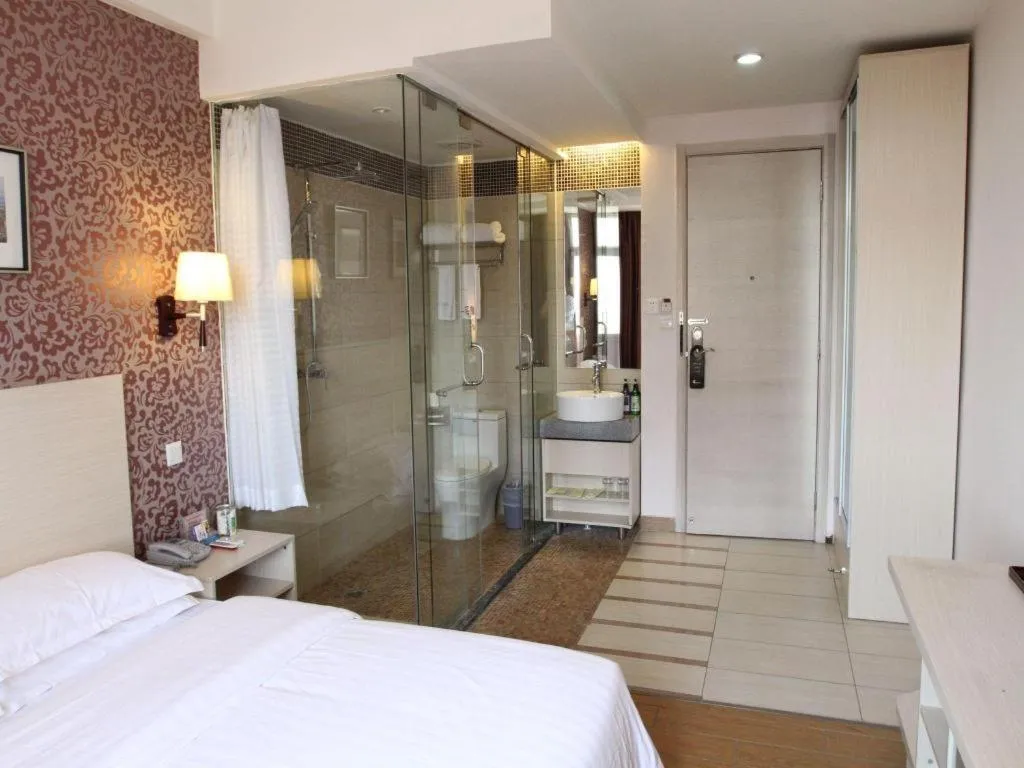 Bed in Pankun Business Hotel