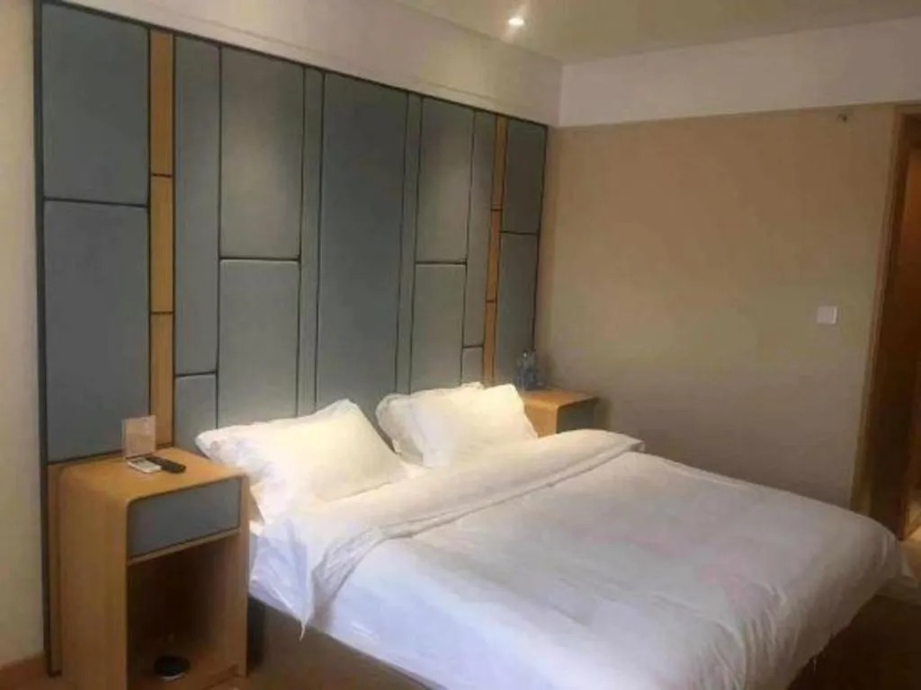 Bed in Pankun Business Hotel