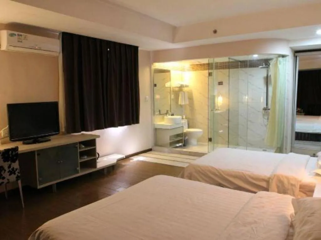 Bed in Pankun Business Hotel