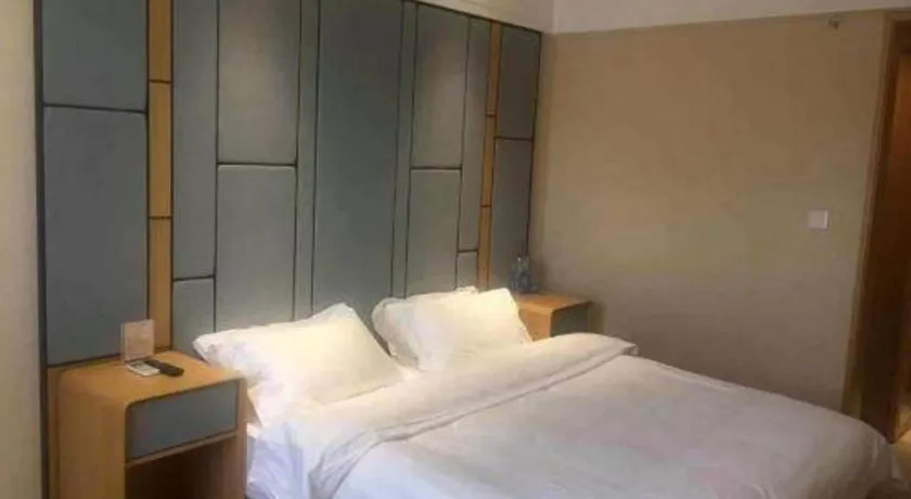 Bed in Pankun Business Hotel