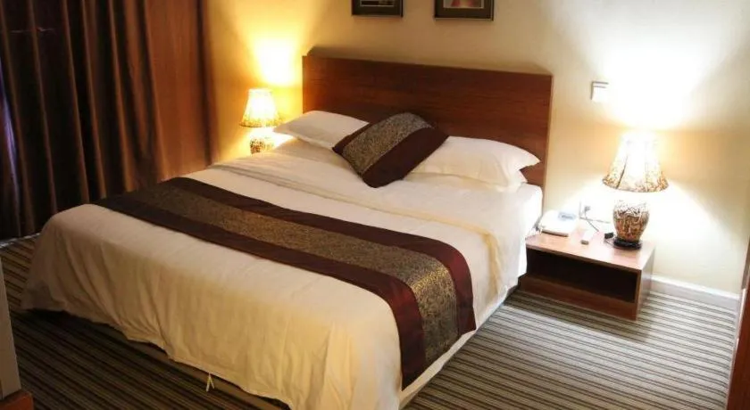 Bed in Pankun Business Hotel