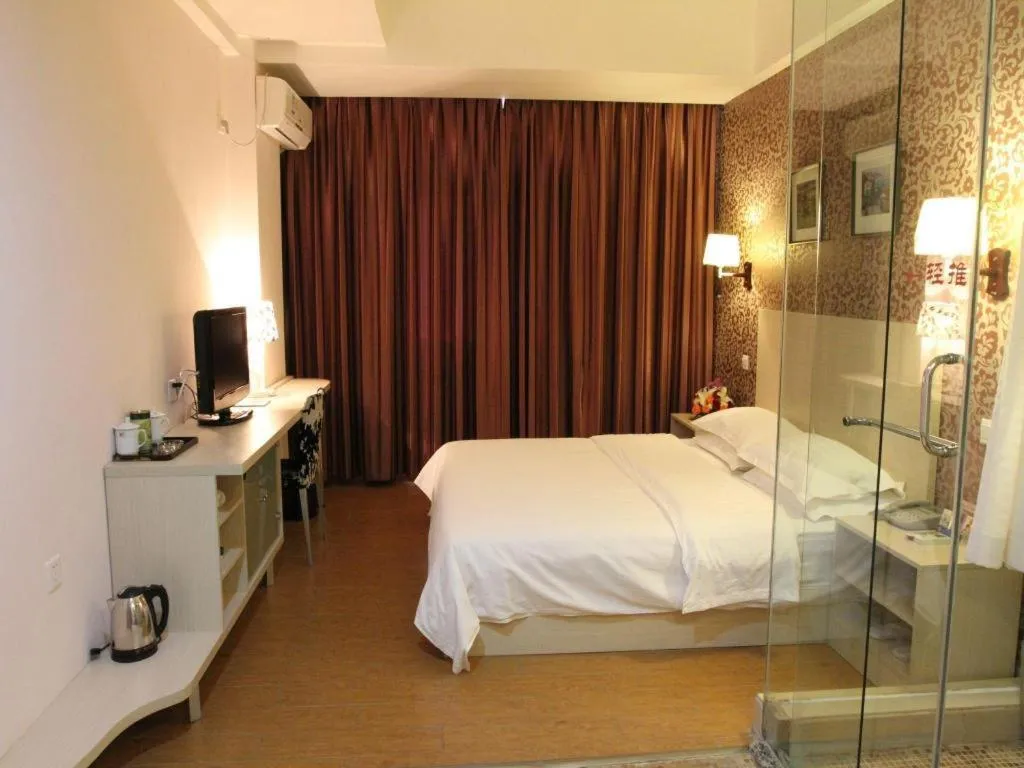 Bed in Pankun Business Hotel