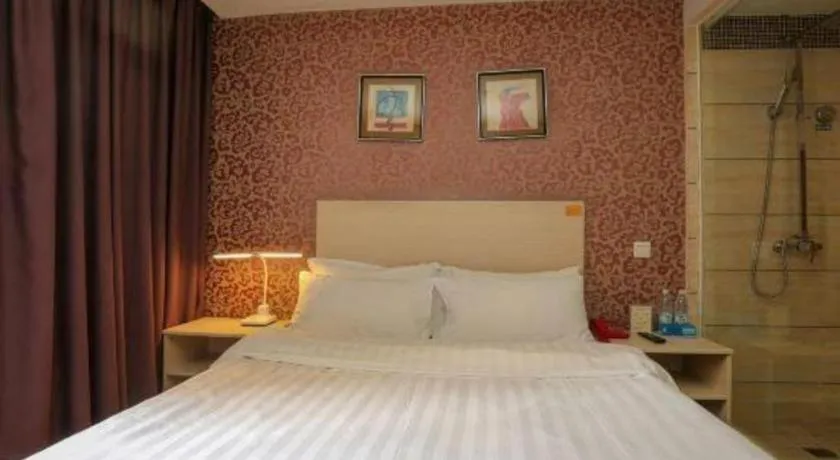 Bed in Pankun Business Hotel