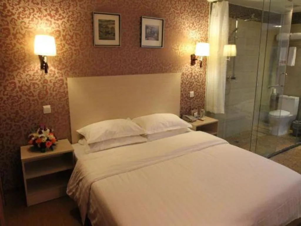 Bed in Pankun Business Hotel
