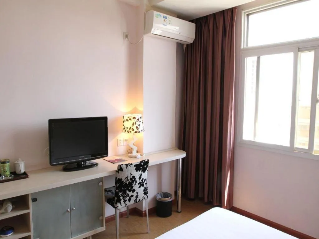 Bed in Pankun Business Hotel