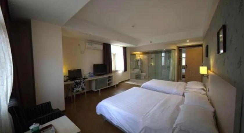Bed in Pankun Business Hotel