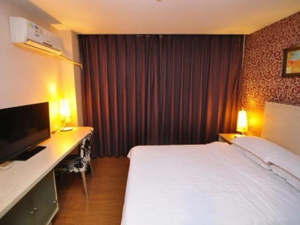 Bed in Pankun Business Hotel