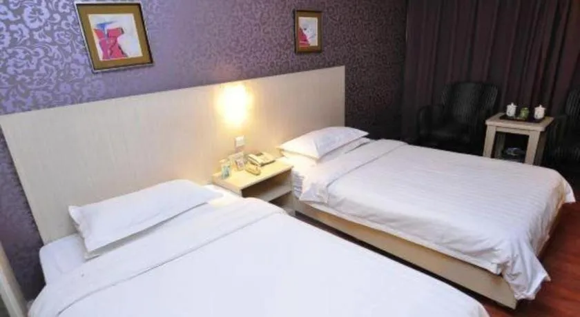 Bed in Pankun Business Hotel