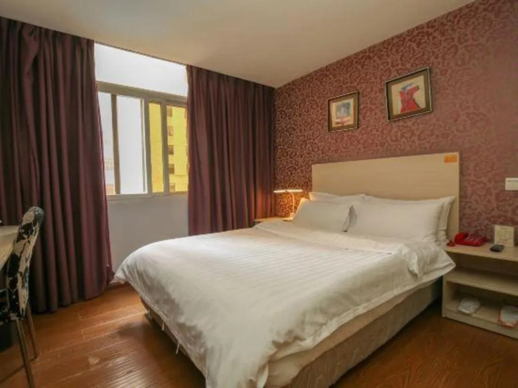 Bed in Pankun Business Hotel