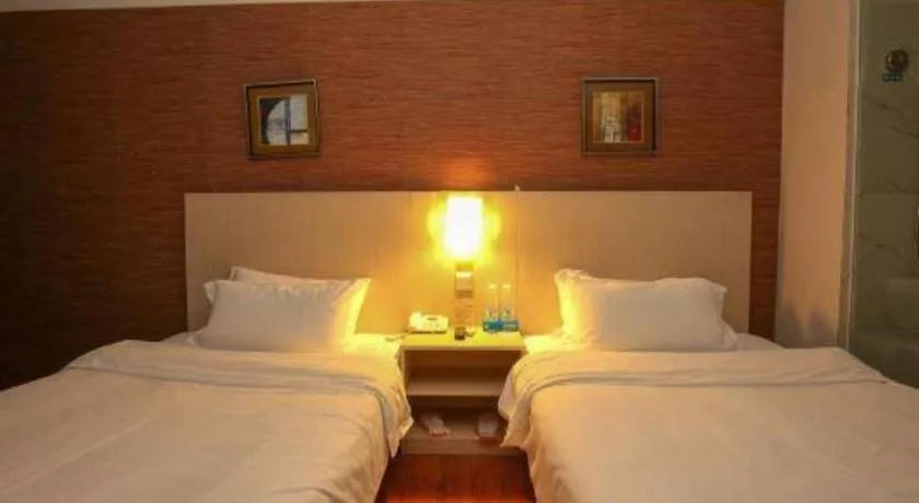 Bed in Pankun Business Hotel