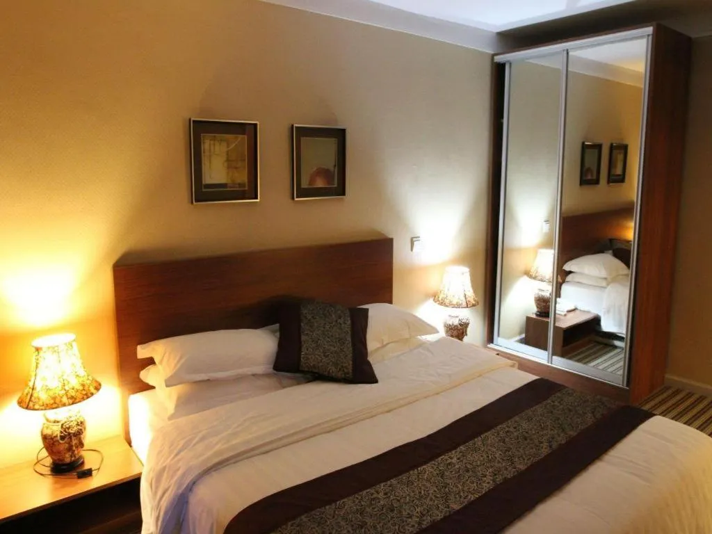 Bed in Pankun Business Hotel