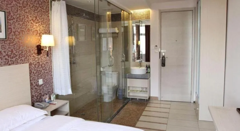 Bed in Pankun Business Hotel