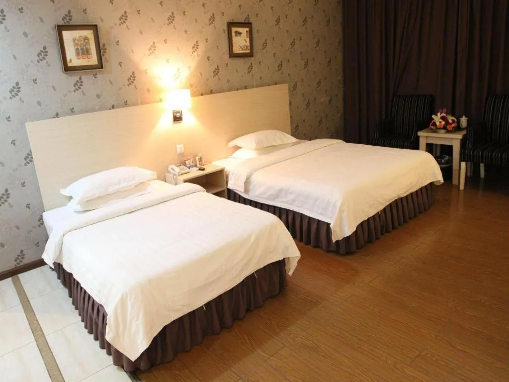 Bed in Pankun Business Hotel