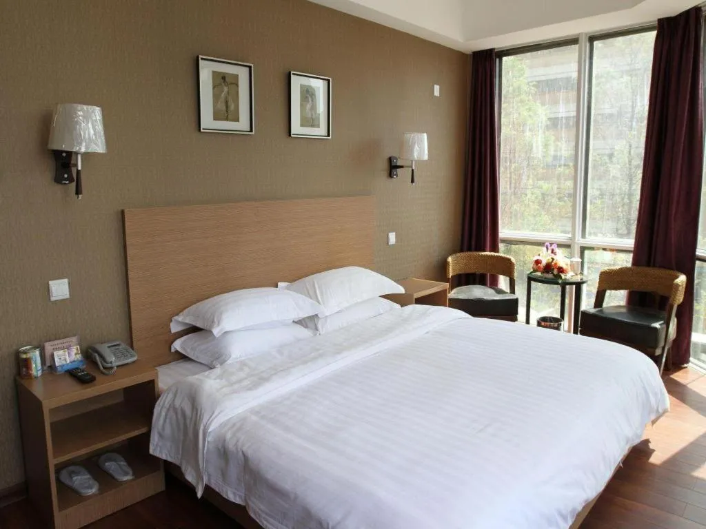 Bed in Pankun Business Hotel