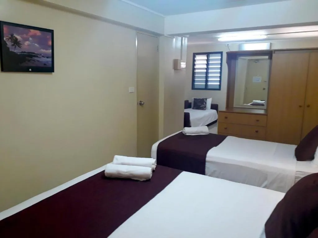 Bed in Victoria Palms Hotel
