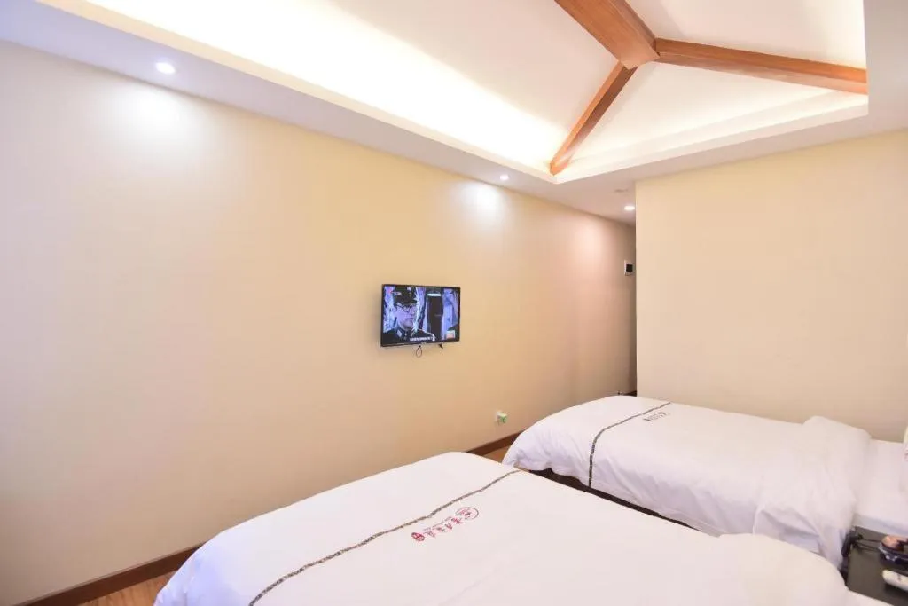 Bed in BOOK PAVILION HOTEL