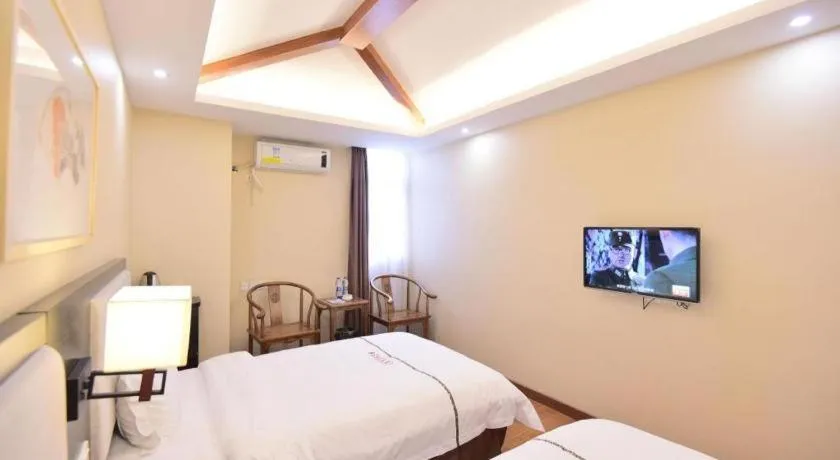 Bed in BOOK PAVILION HOTEL