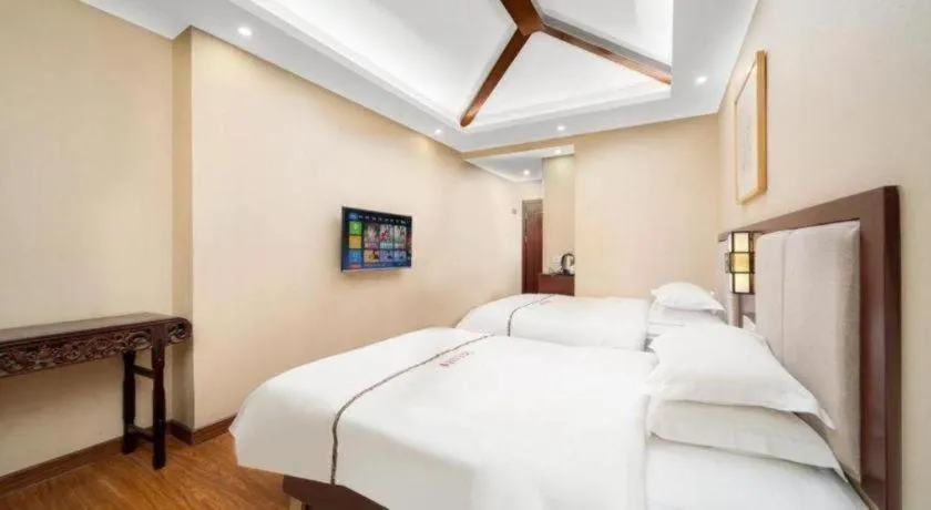 Bed in BOOK PAVILION HOTEL