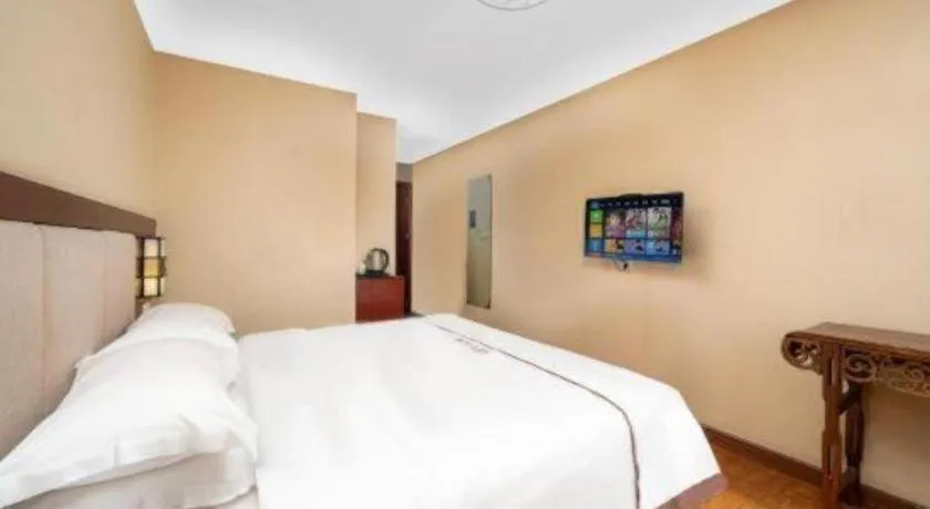 Bed in BOOK PAVILION HOTEL