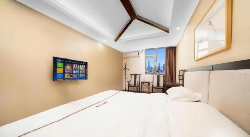 Bed in BOOK PAVILION HOTEL