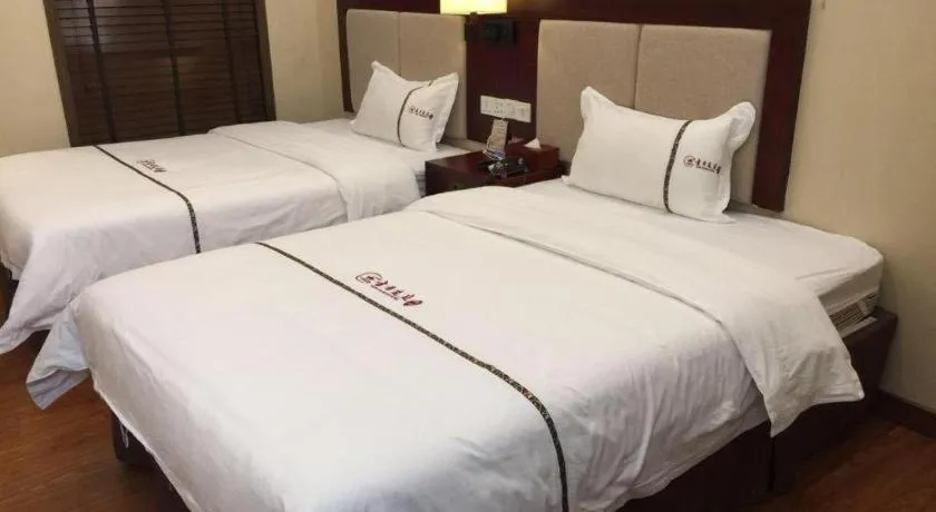 Bed in BOOK PAVILION HOTEL