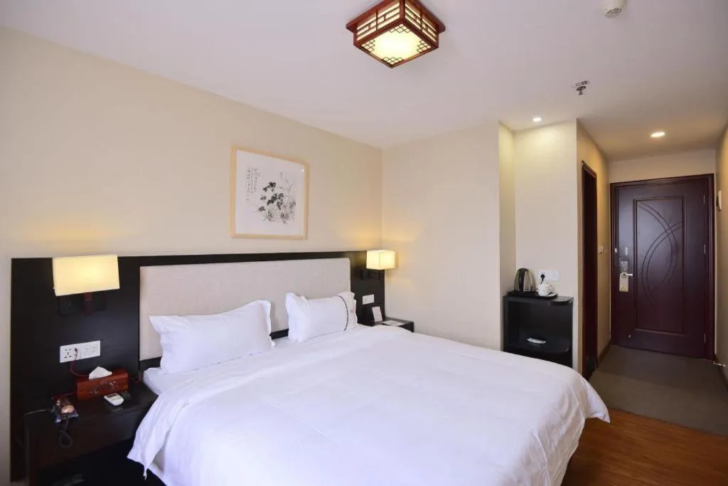 Bed in BOOK PAVILION HOTEL