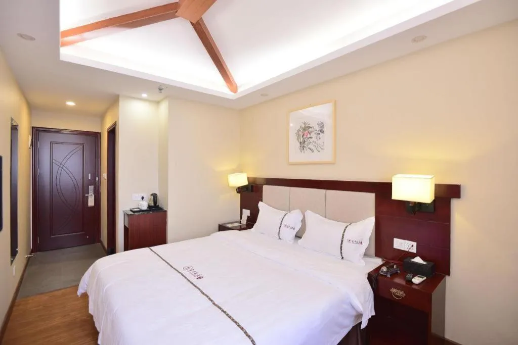 Bed in BOOK PAVILION HOTEL