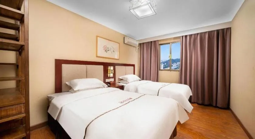 Bed in BOOK PAVILION HOTEL