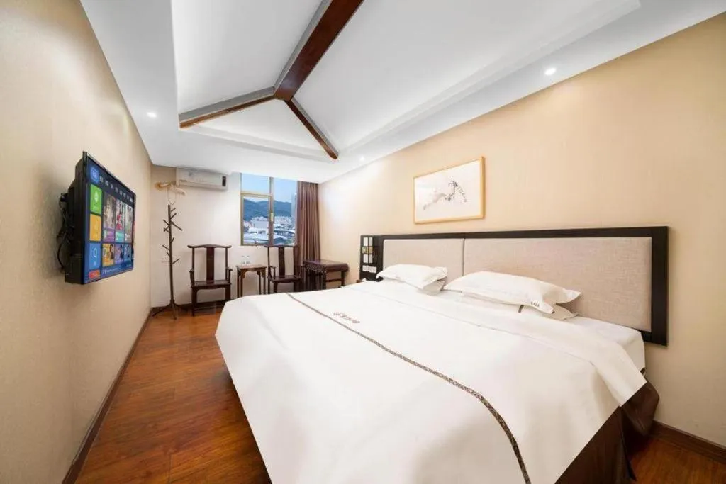 Bed in BOOK PAVILION HOTEL