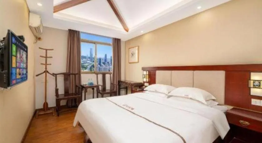 Bed in BOOK PAVILION HOTEL