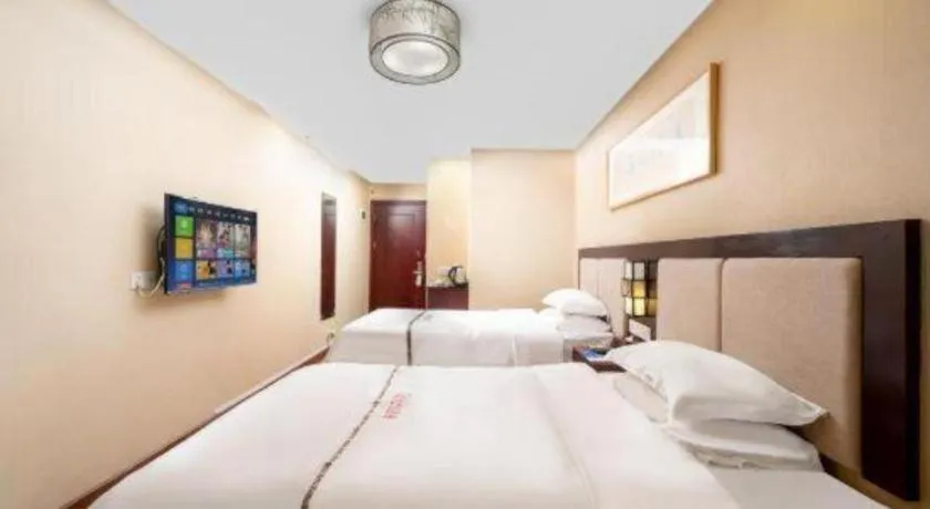 Bed in BOOK PAVILION HOTEL