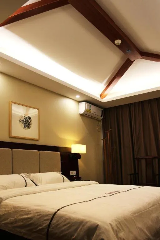 Bed in BOOK PAVILION HOTEL