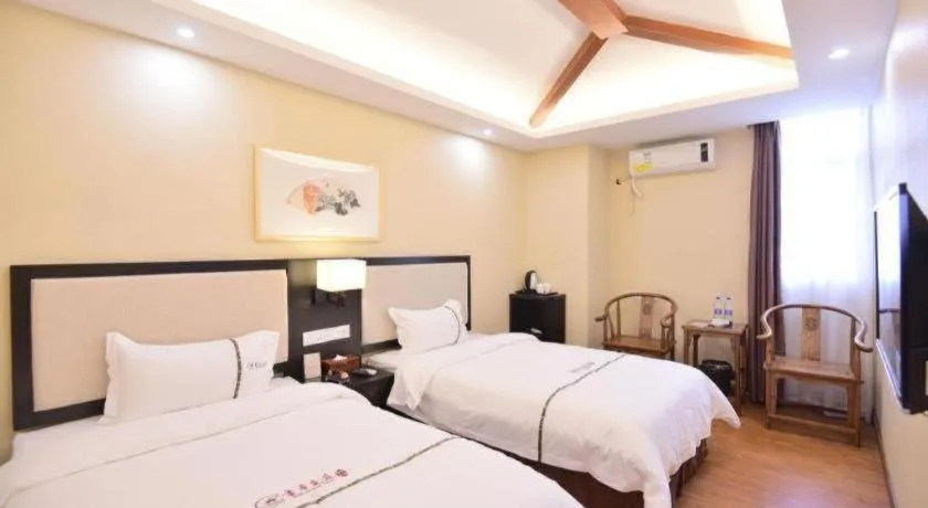 Bed in BOOK PAVILION HOTEL