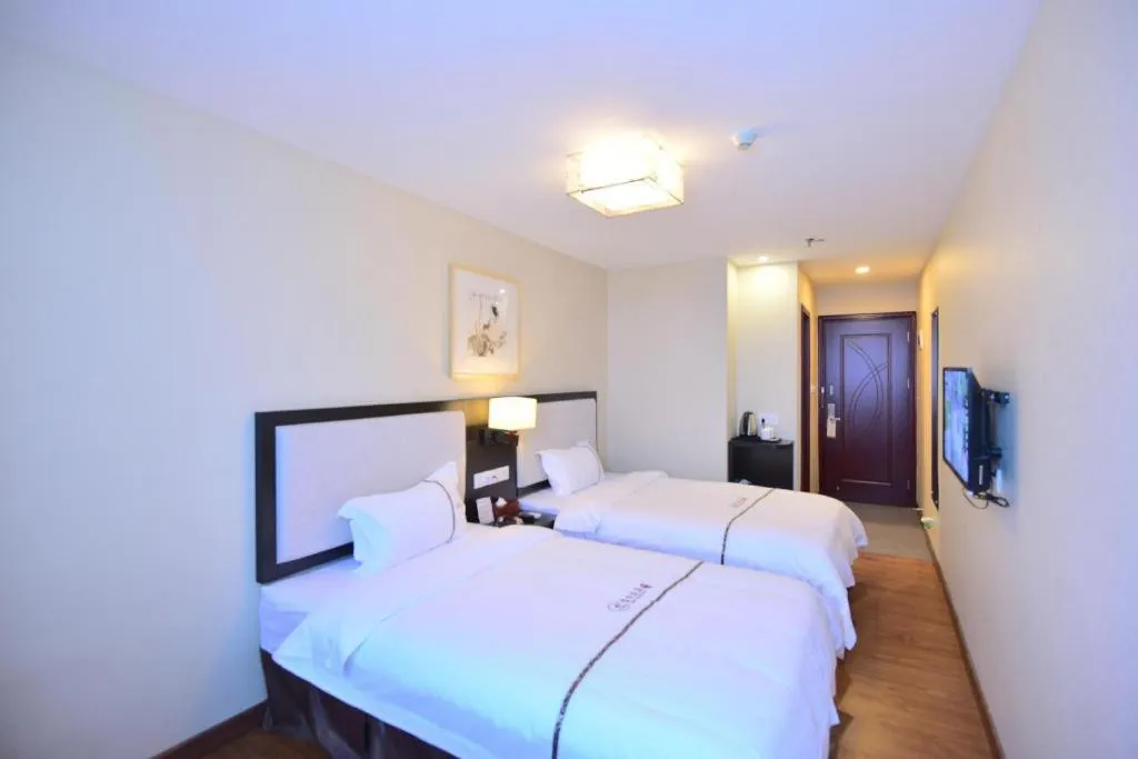 Bed in BOOK PAVILION HOTEL