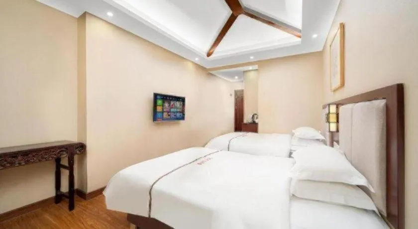 Bed in BOOK PAVILION HOTEL