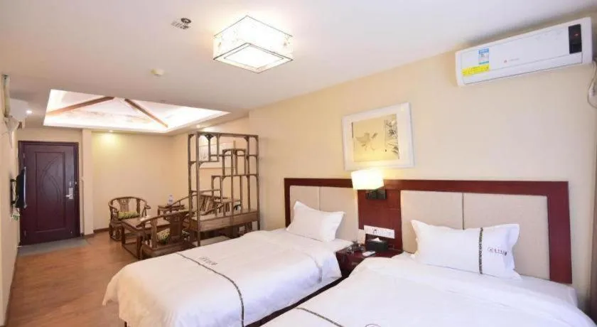 Bed in BOOK PAVILION HOTEL