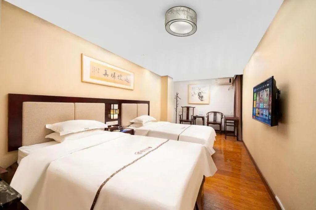 Bed in BOOK PAVILION HOTEL