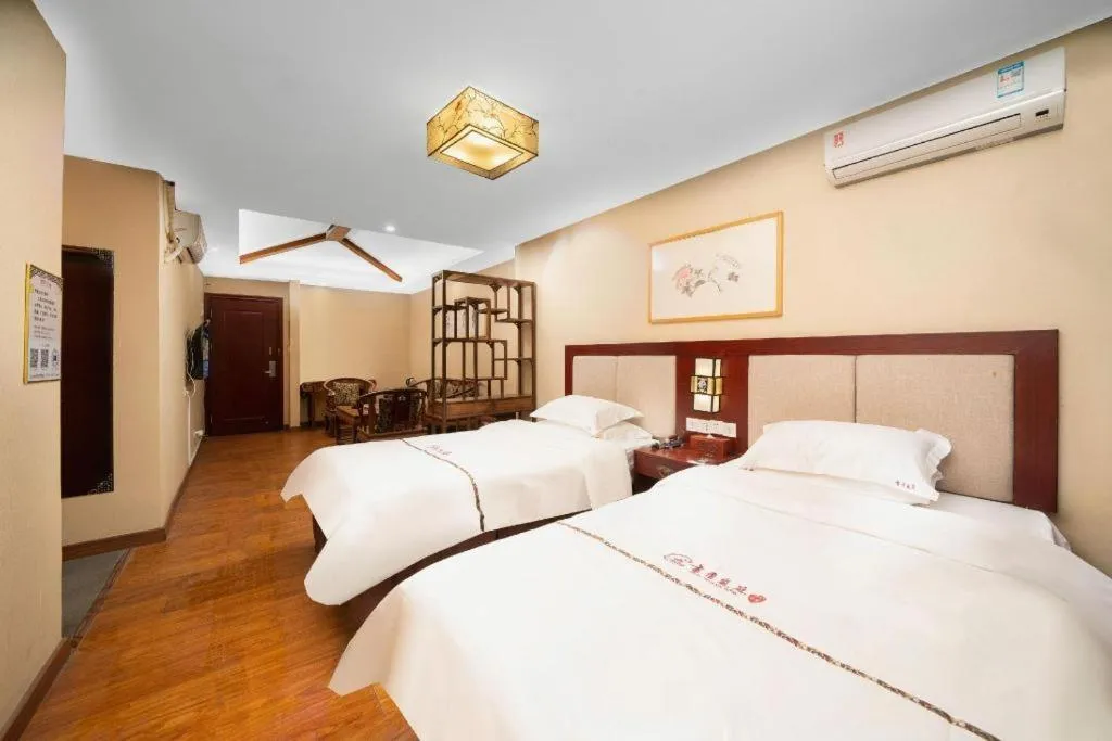 Bed in BOOK PAVILION HOTEL