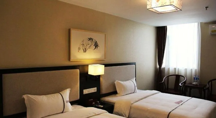 Bed in BOOK PAVILION HOTEL