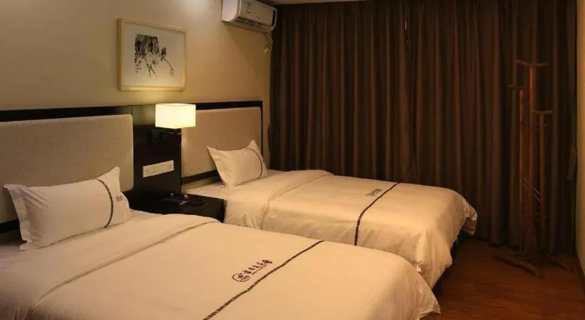 Bed in BOOK PAVILION HOTEL