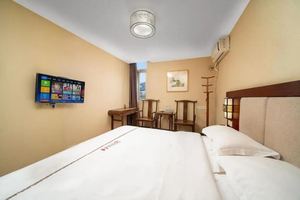 Bed in BOOK PAVILION HOTEL