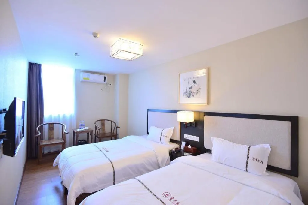 Bed in BOOK PAVILION HOTEL