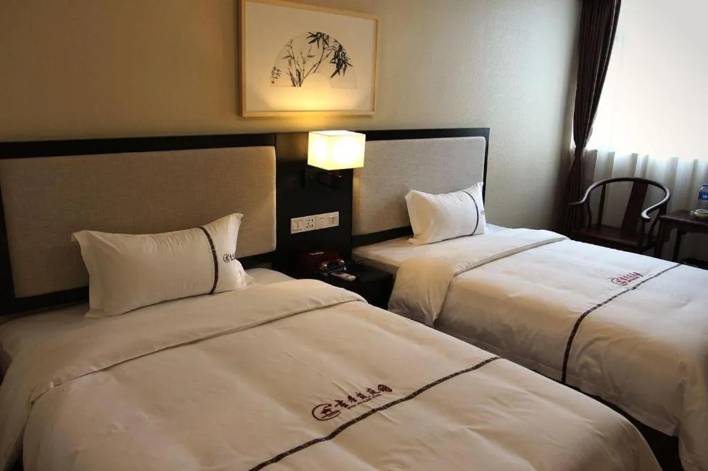 Bed in BOOK PAVILION HOTEL